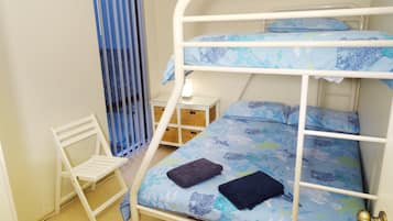 Premier Family Apartment, 2 Bedrooms (1 Queen, 1 Tri-bunk and 1 Sofa bed) | 1 bedroom, iron/ironing board, free cots/infant beds, rollaway beds