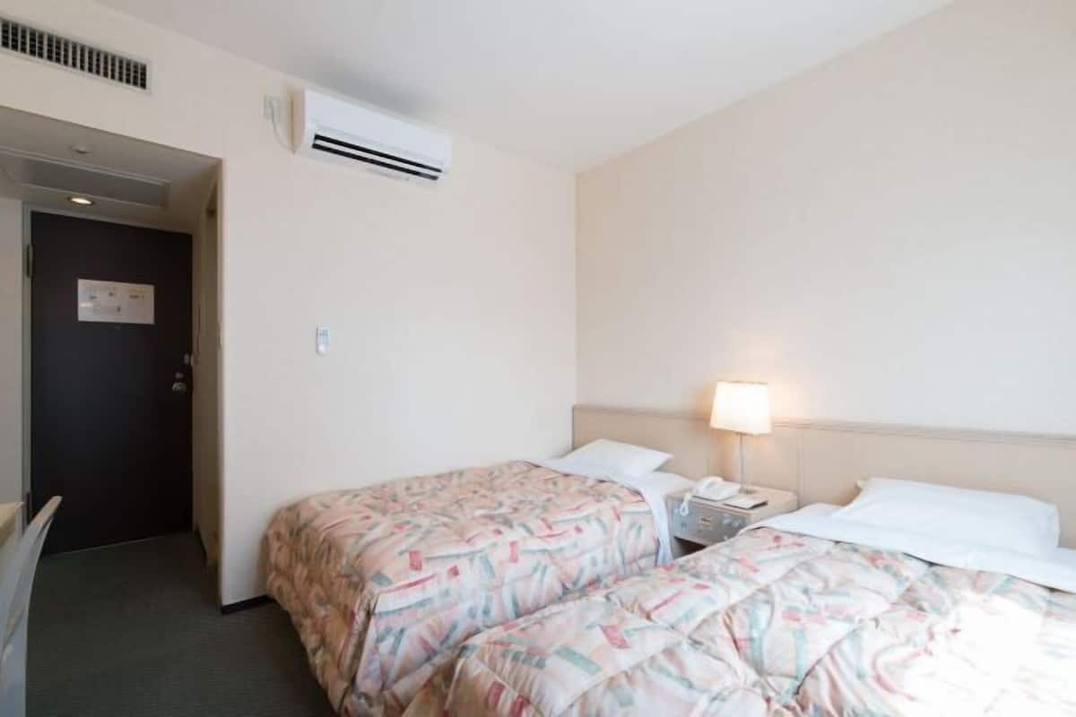 Laptop workspace, iron/ironing board, free wired internet, bed sheets