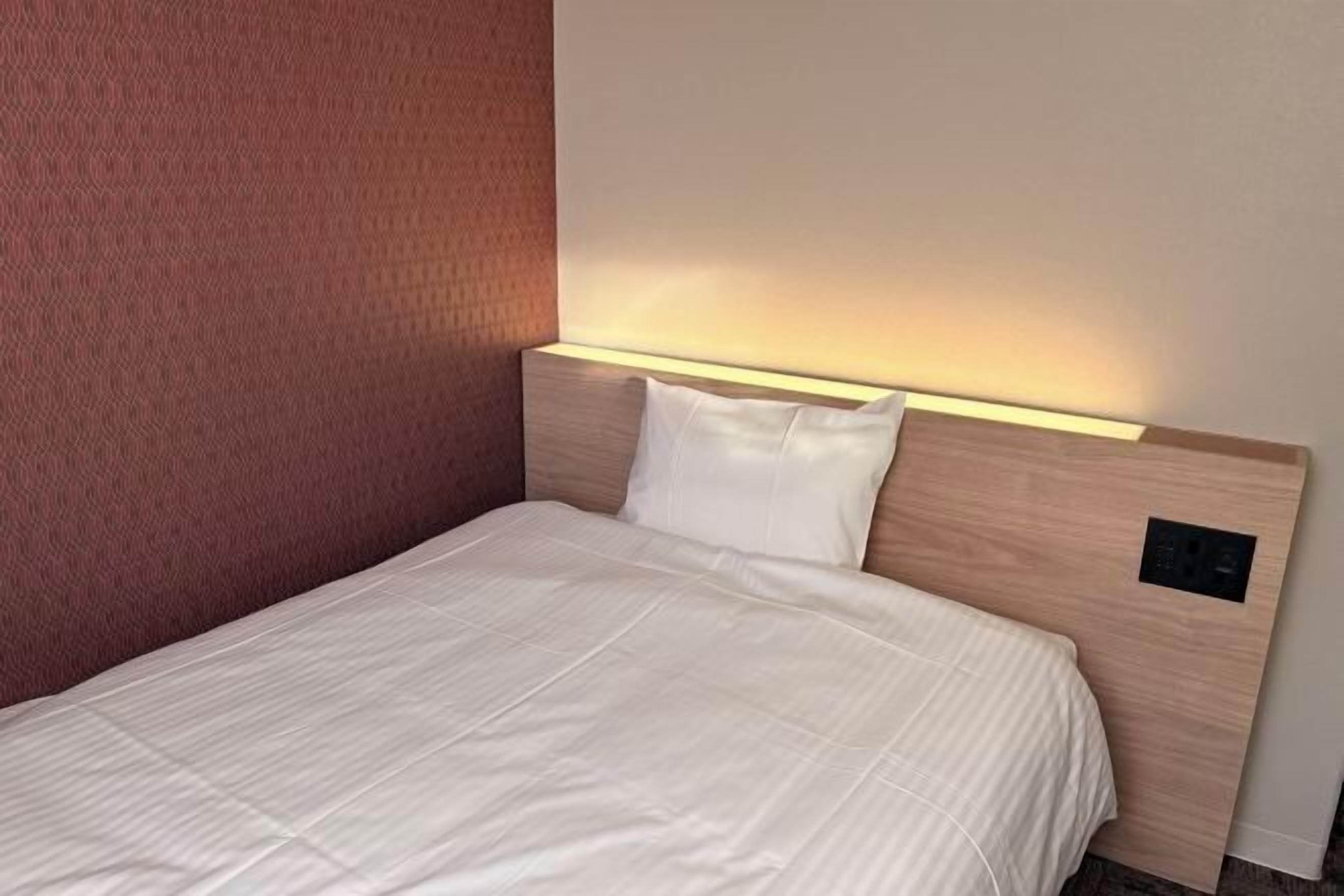 Laptop workspace, iron/ironing board, free wired Internet, bed sheets