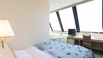 Deluxe Room, City View | Laptop workspace, iron/ironing board, free wired Internet, bed sheets