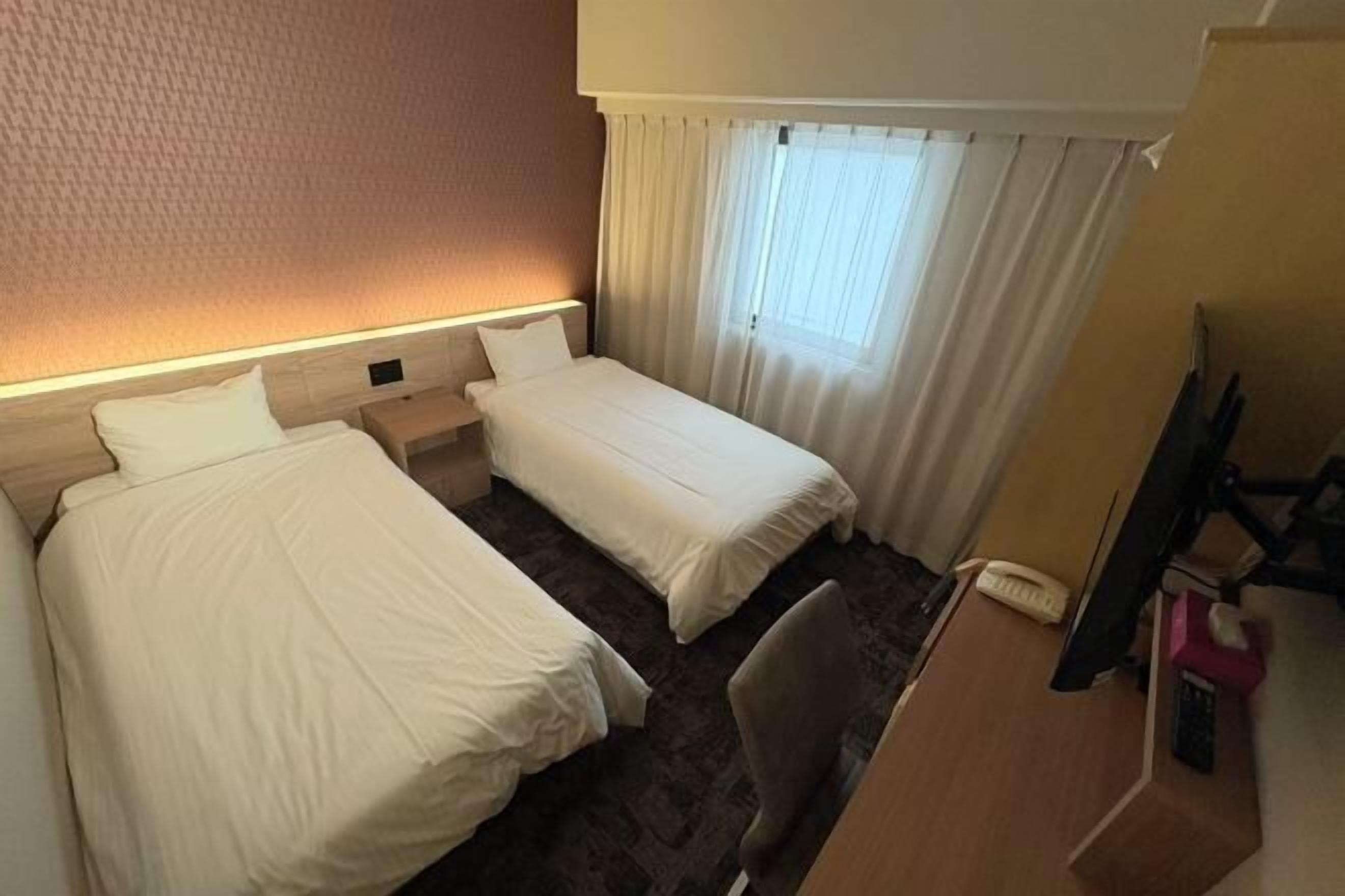 Laptop workspace, iron/ironing board, free wired internet, bed sheets