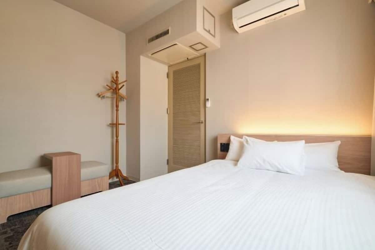 Laptop workspace, iron/ironing board, free wired Internet, bed sheets