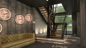 A modern interior with a sofa, a staircase, and wall clocks.