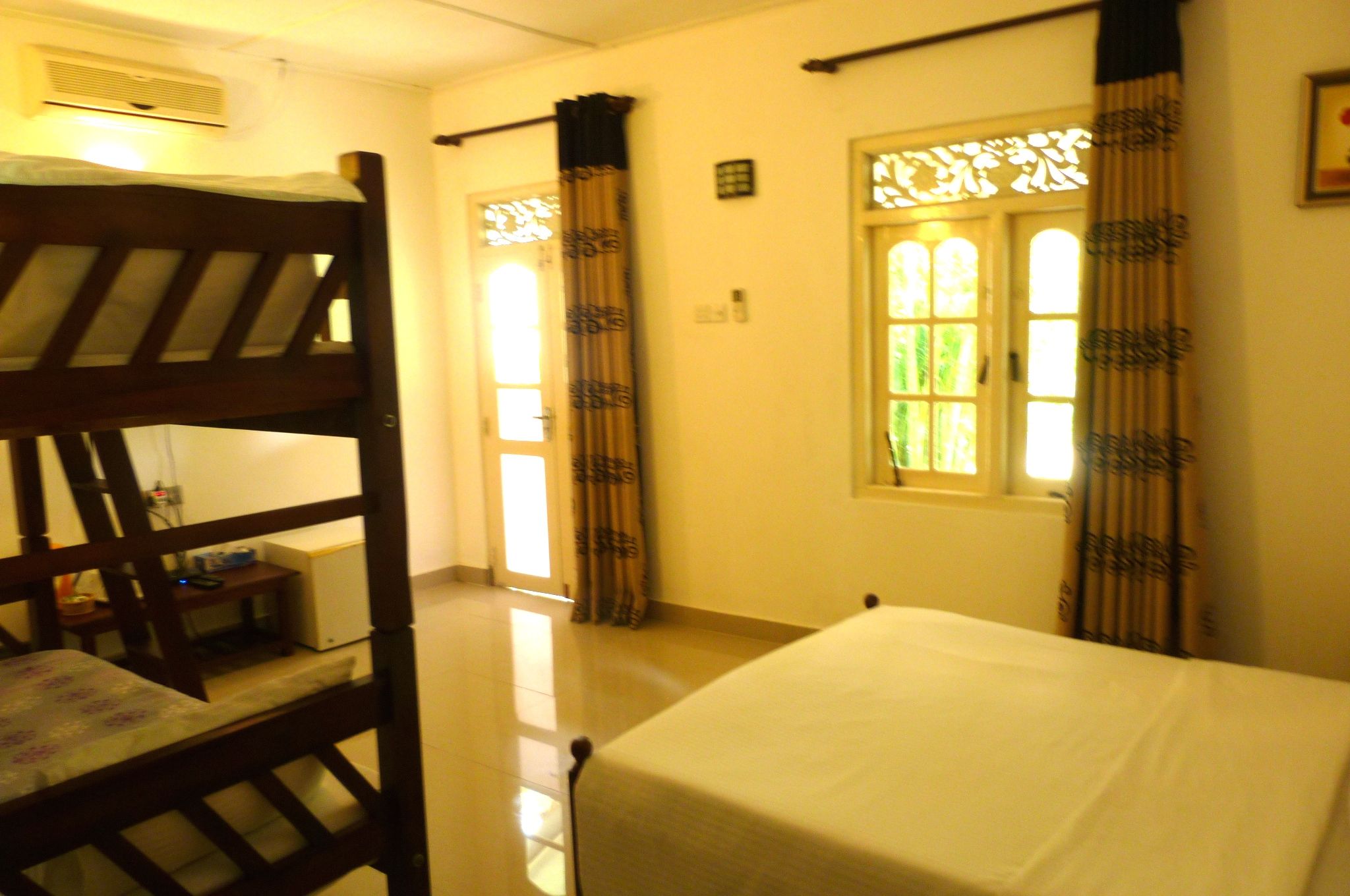 standard quadruple room, 1 bedroom, garden view | premium bedding, iron/ironing board, rollaway beds, free wifi