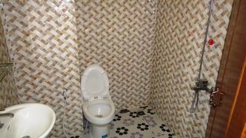 Superior Triple Room (with AC) | Bathroom | Free toiletries, slippers, towels