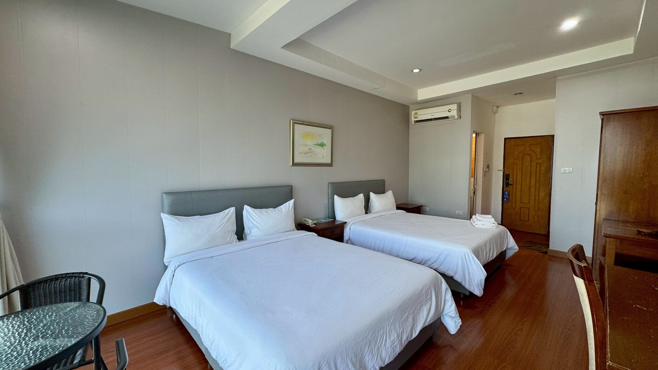 Deluxe Room, 2 Queen Beds | Minibar, desk, free WiFi, bed sheets
