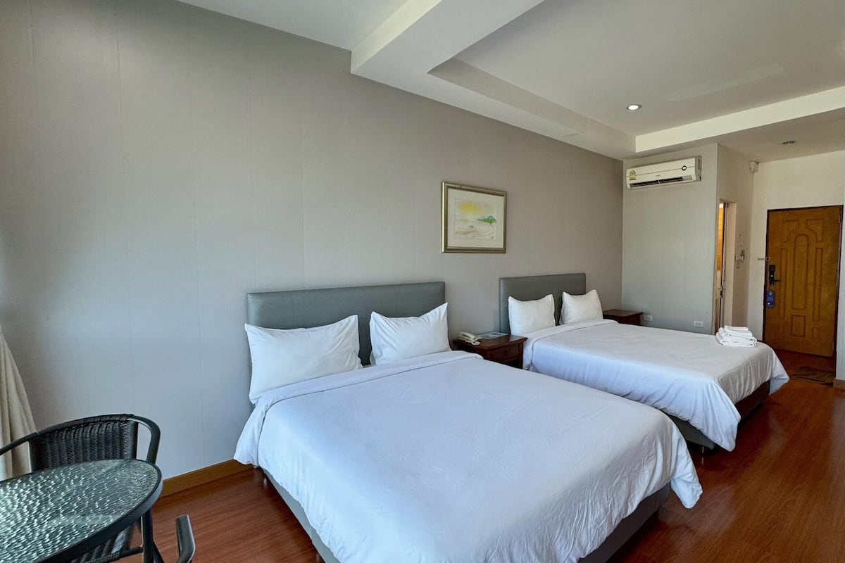 Deluxe Room, 2 Queen Beds | Minibar, desk, free WiFi, bed sheets