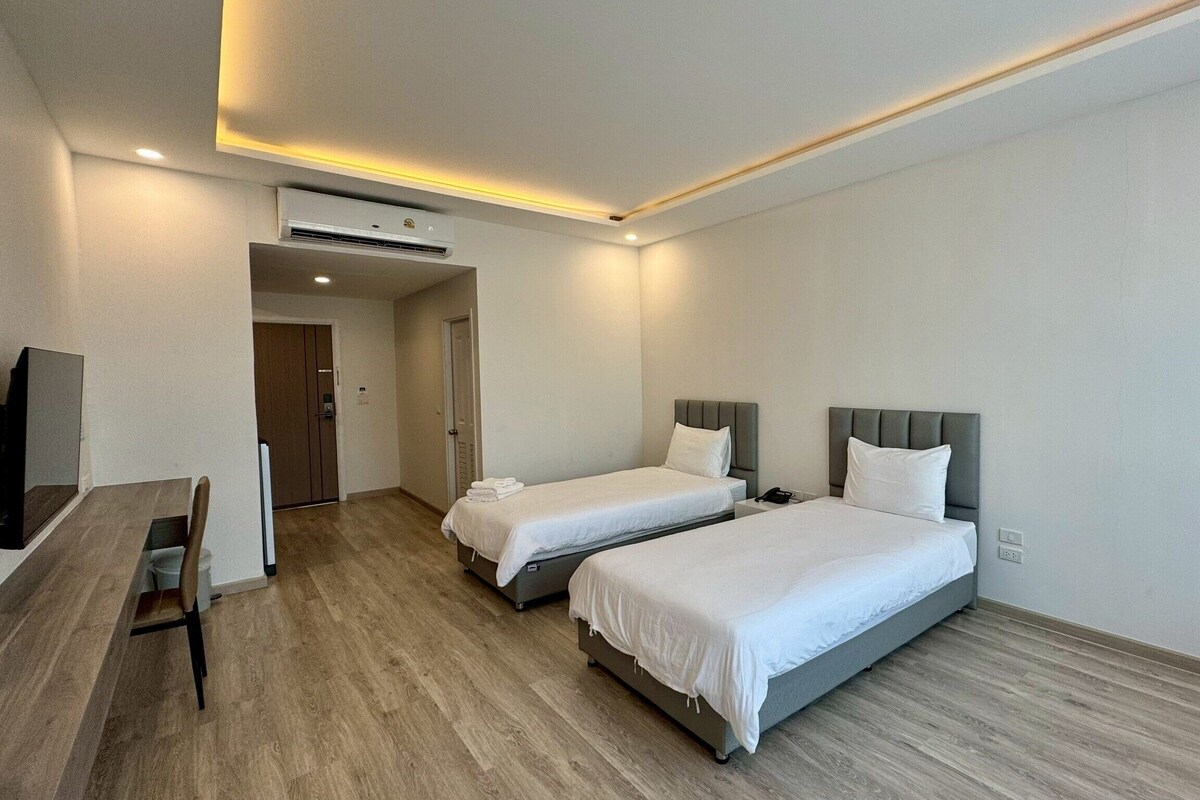 Premier-Zweibettzimmer, 2 Einzelbetten, Gartenblick | Minibar, Schreibtisch, kostenloses WLAN, Bettwäsche