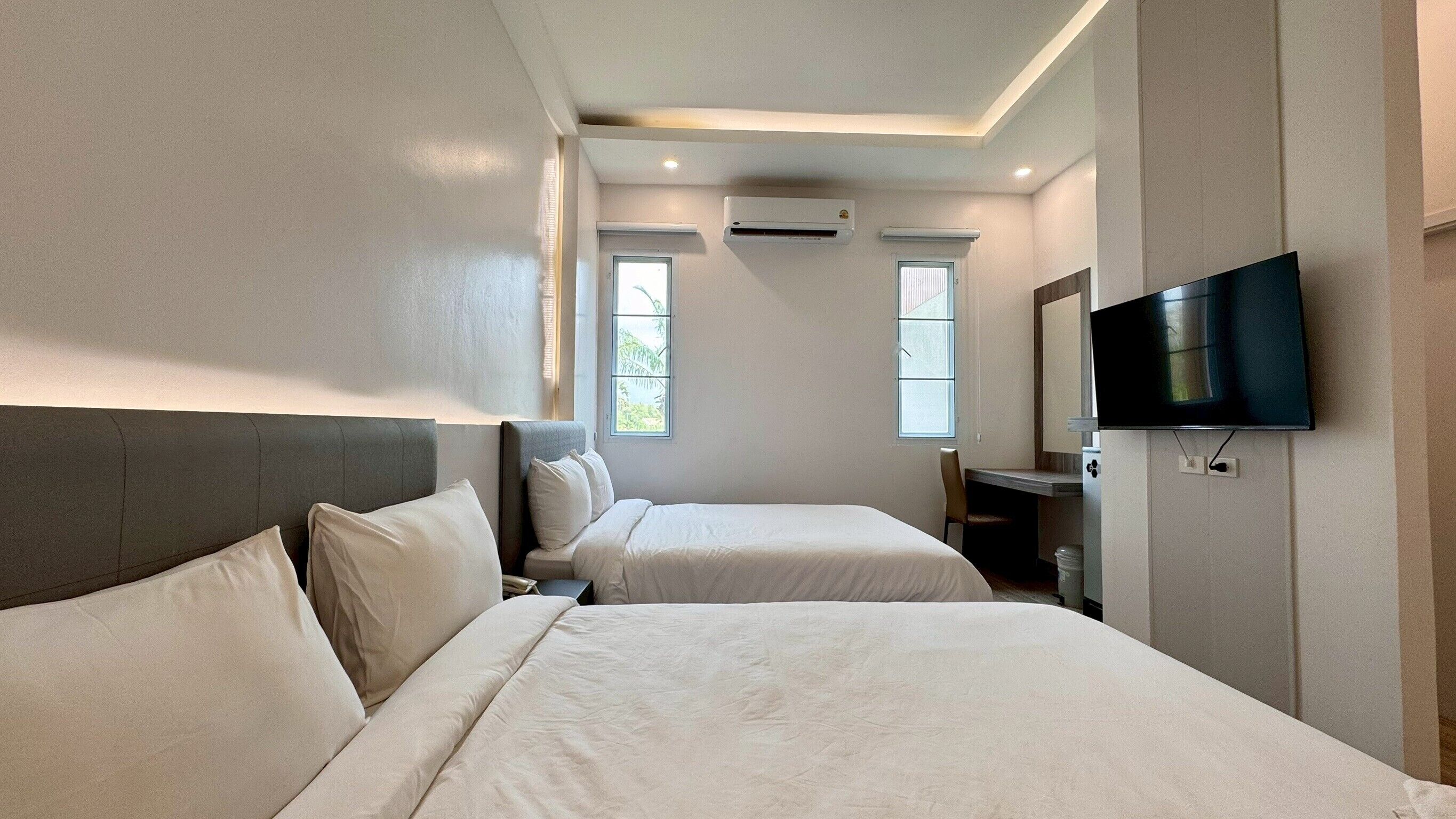 Premier kamer, 2 queensize bedden | Een minibar, een bureau, gratis wifi, beddengoed