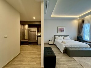 Premium Room, 1 King Bed, Pool View | Minibar, desk, free WiFi, bed sheets