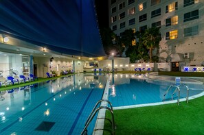 Seasonal outdoor pool, open 11:00 AM to 6:00 PM, pool umbrellas