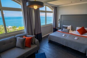 Deluxe Double or Twin Room | Living area | LCD TV