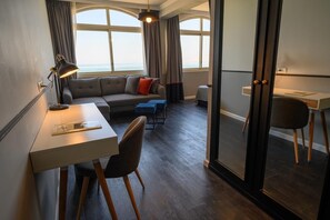 Deluxe Double or Twin Room | Living area | LCD TV - Royal Plaza Hotel (Tiberias)