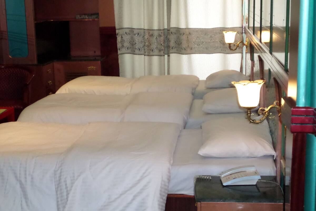 Triple Room | Minibar, desk, iron/ironing board, free WiFi