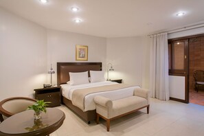 Premium bedding, free minibar items, in-room safe