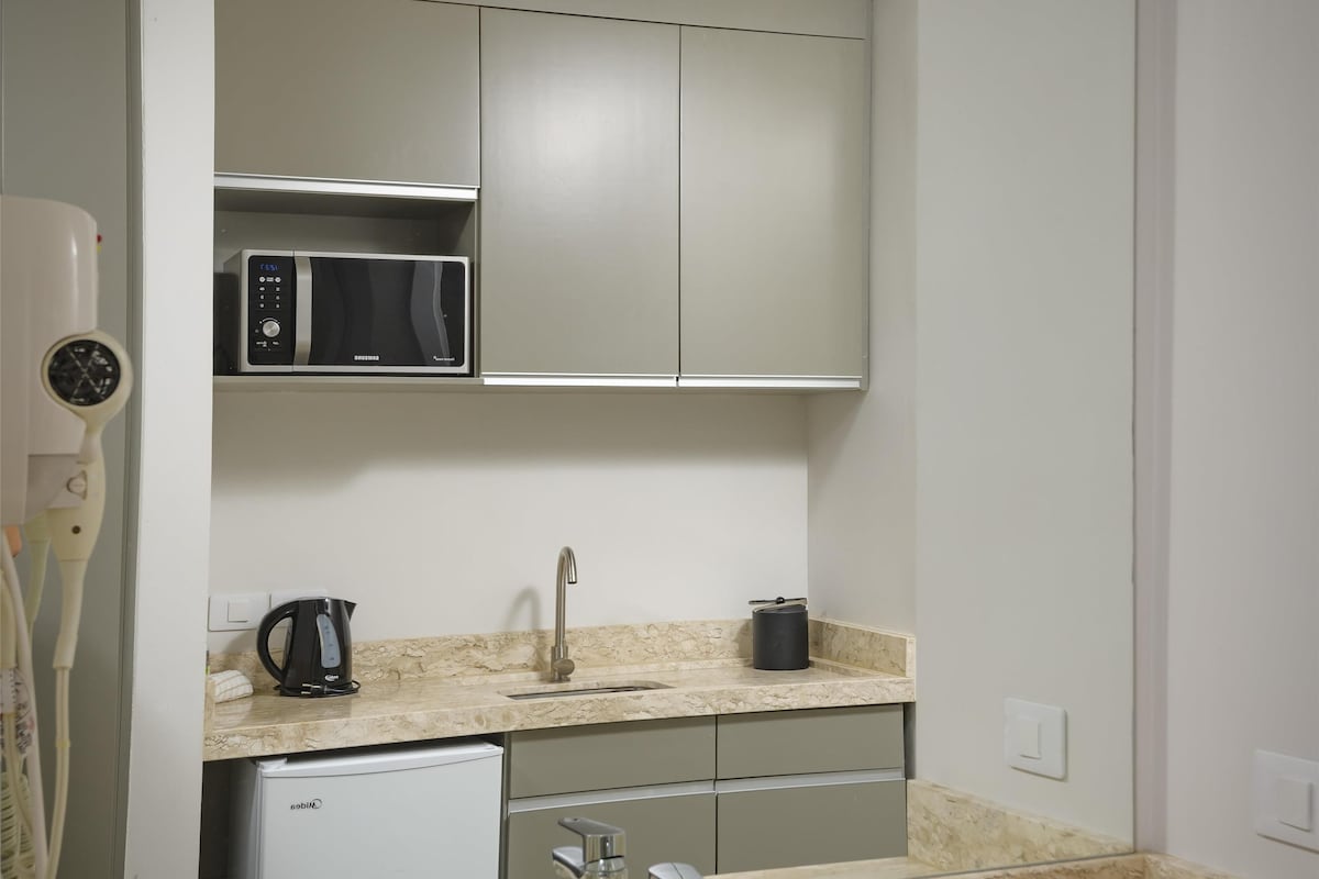 Coffee/tea maker, fridge, microwave, electric kettle