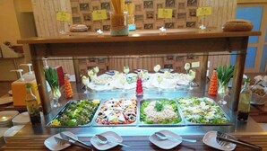 A buffet with various food options, including salads, pasta, and seafood. - Tintyava Park Hotel (Varna)