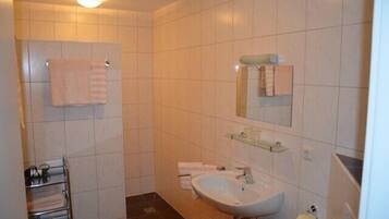Double Room, Balcony | Bathroom | Shower, free toiletries, hair dryer, towels