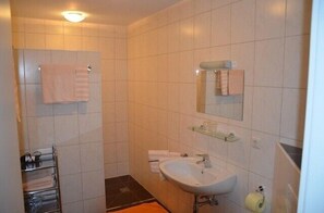 Double Room, Balcony | Bathroom | Shower, free toiletries, hair dryer, towels