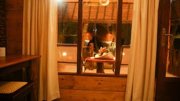 Deluxe Cabin, Sea View, Beachfront | Minibar, in-room safe, desk, iron/ironing board