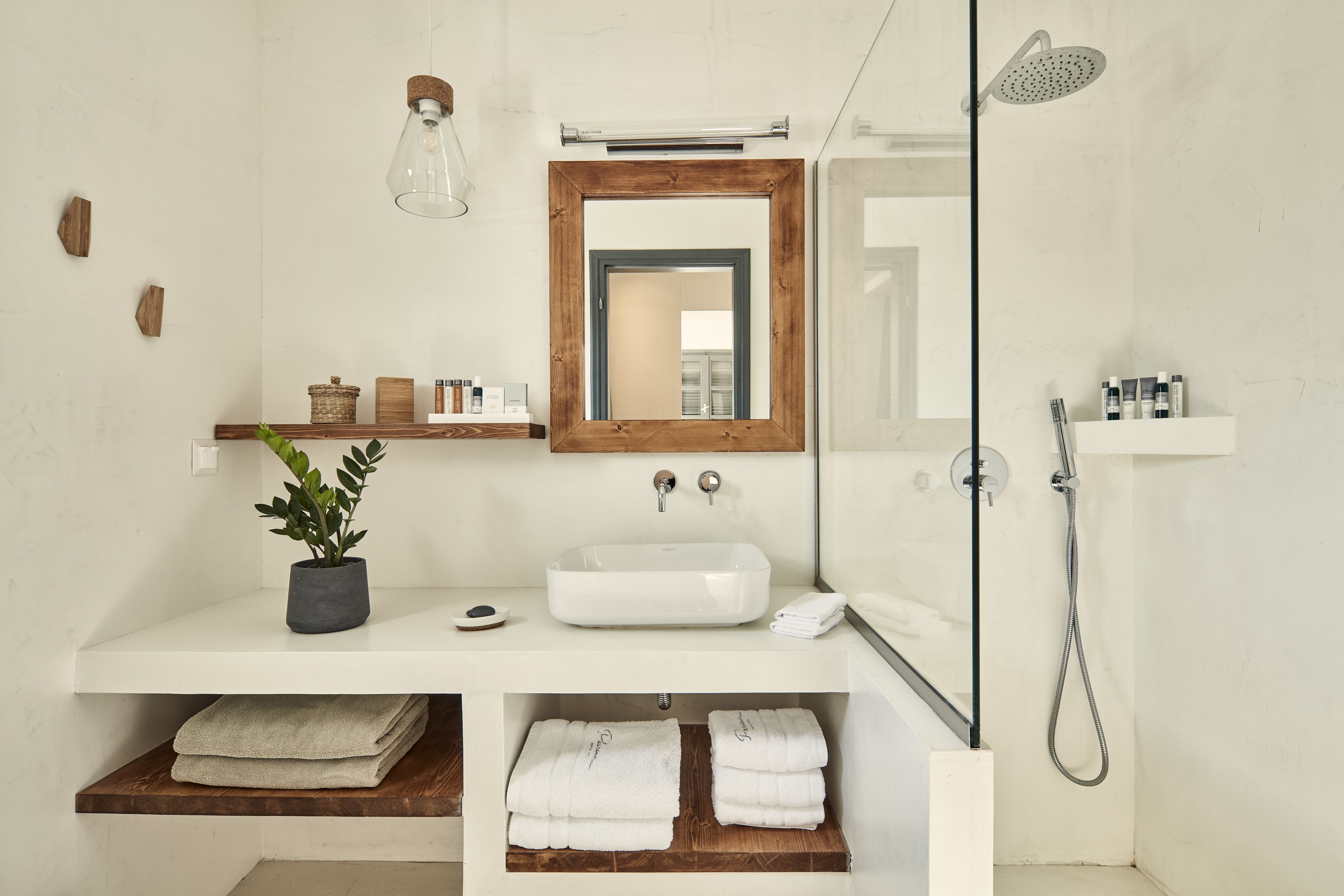 junior suite | bathroom | shower, free toiletries, hair dryer, bathrobes