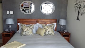 Premium bedding, free minibar items, desk, cots/infant beds