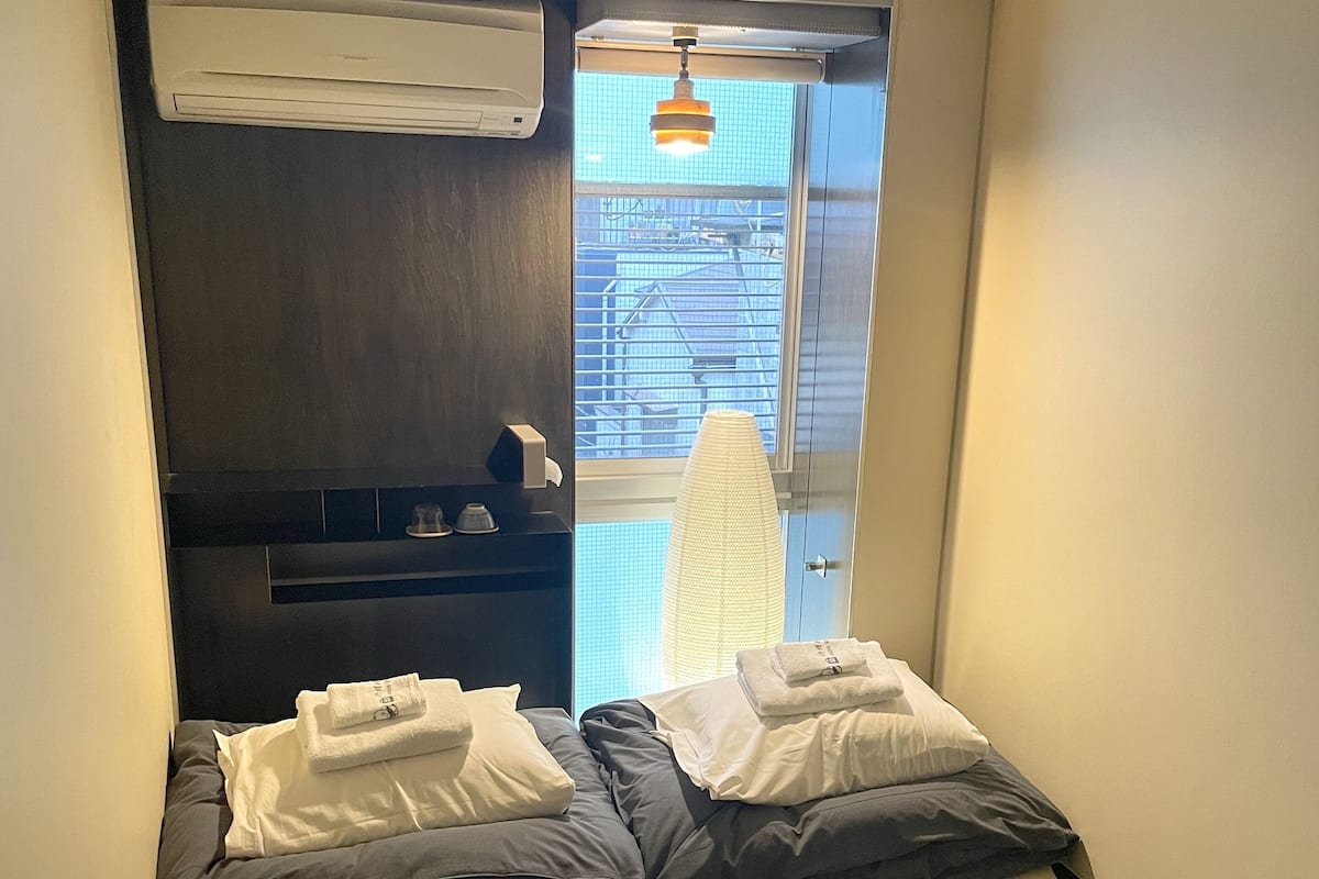 Japanese-style twin room with shared bathroom