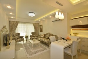 Apartment, 2 Bedrooms | Living room | LCD TV