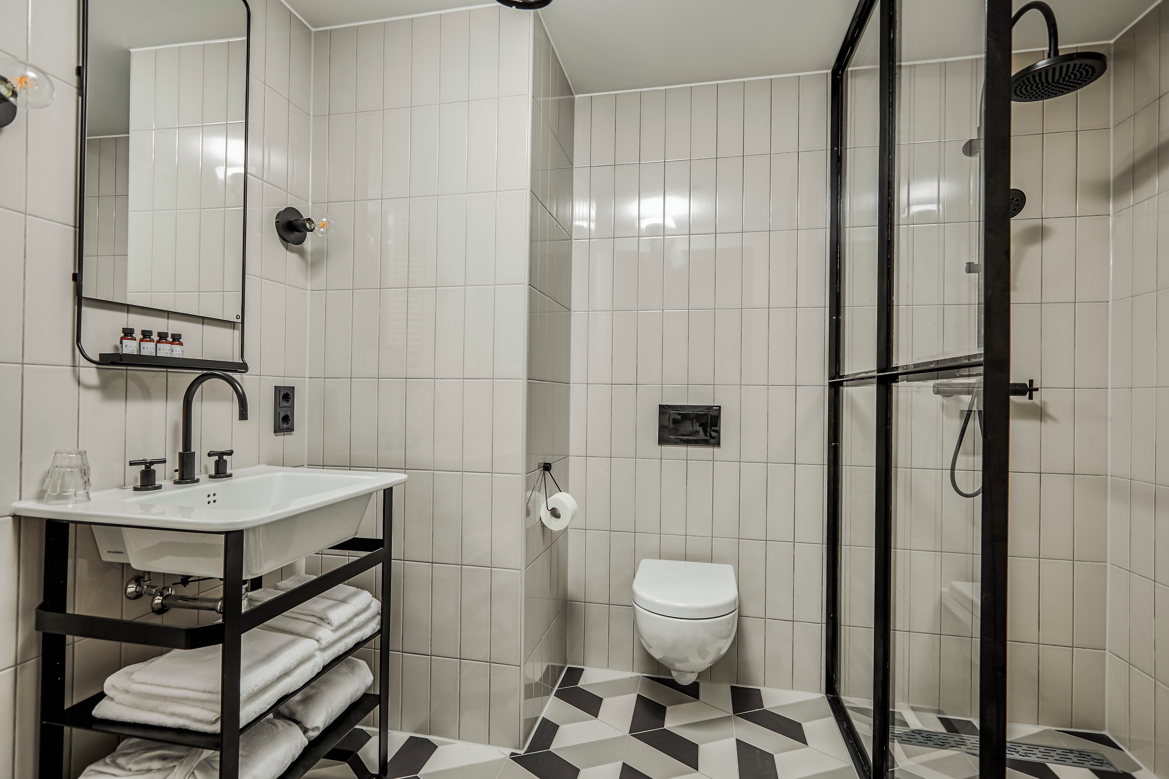 deluxe double room | bathroom | shower, designer toiletries, hair dryer, bathrobes