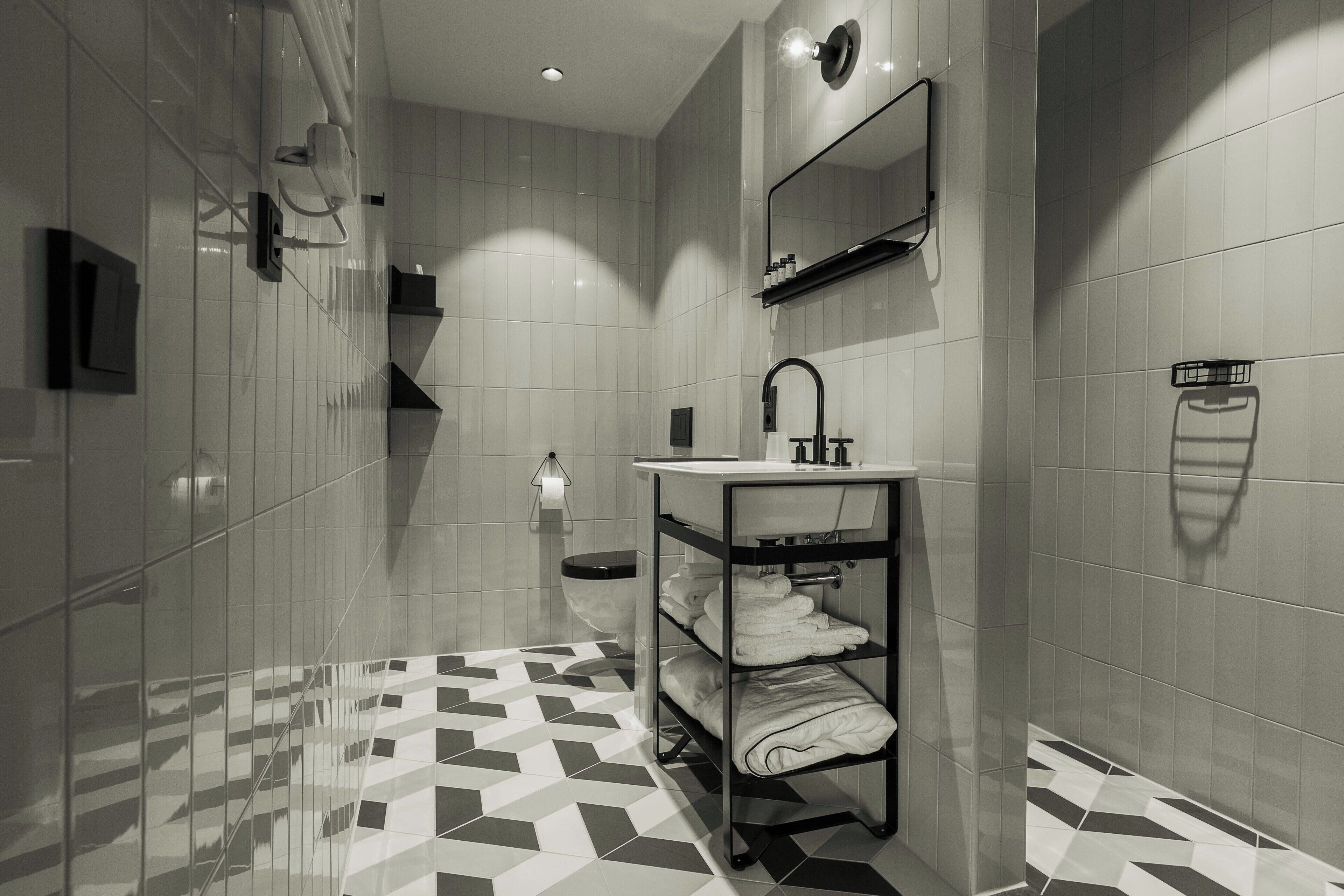 premium double room | bathroom | shower, designer toiletries, hair dryer, bathrobes