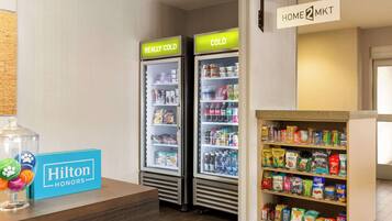 Two ice cream freezers labeled "Really Cold" and "Cold" in a hotel setting.