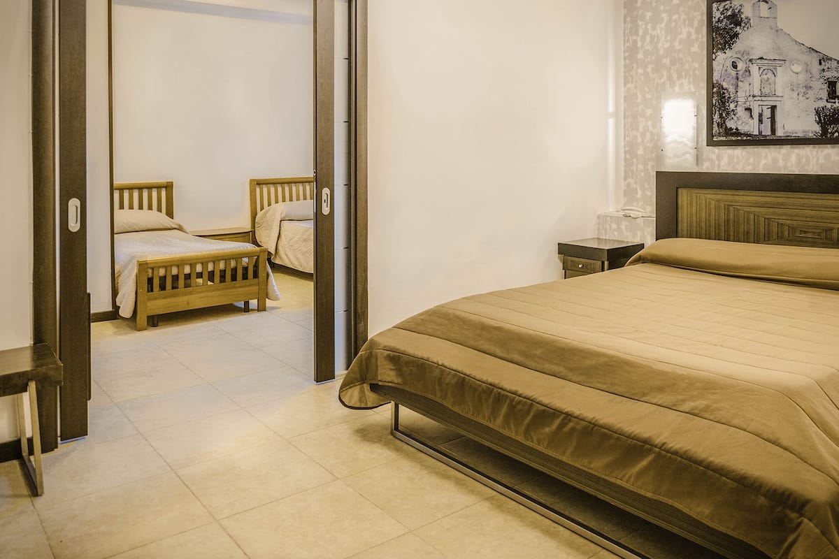 quadruple room | 1 bedroom, down duvets, minibar, in-room safe