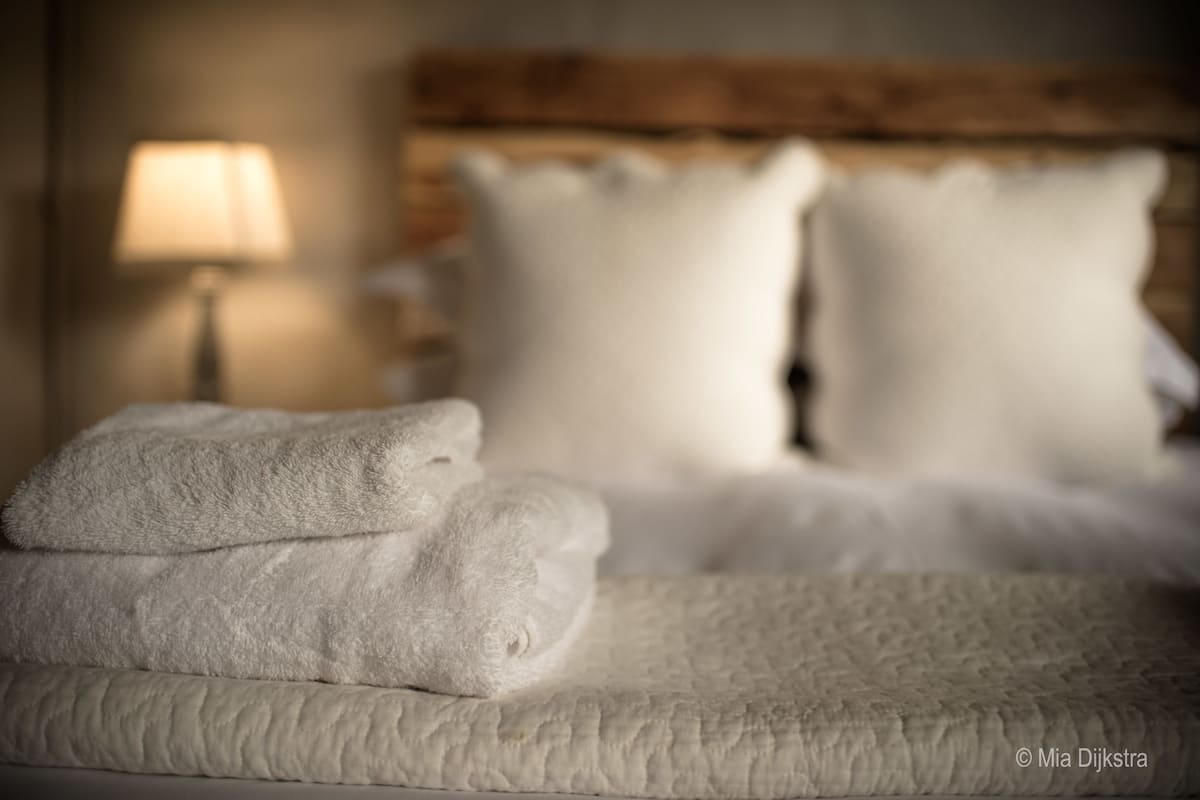 Egyptian cotton sheets, premium bedding, down comforters, minibar