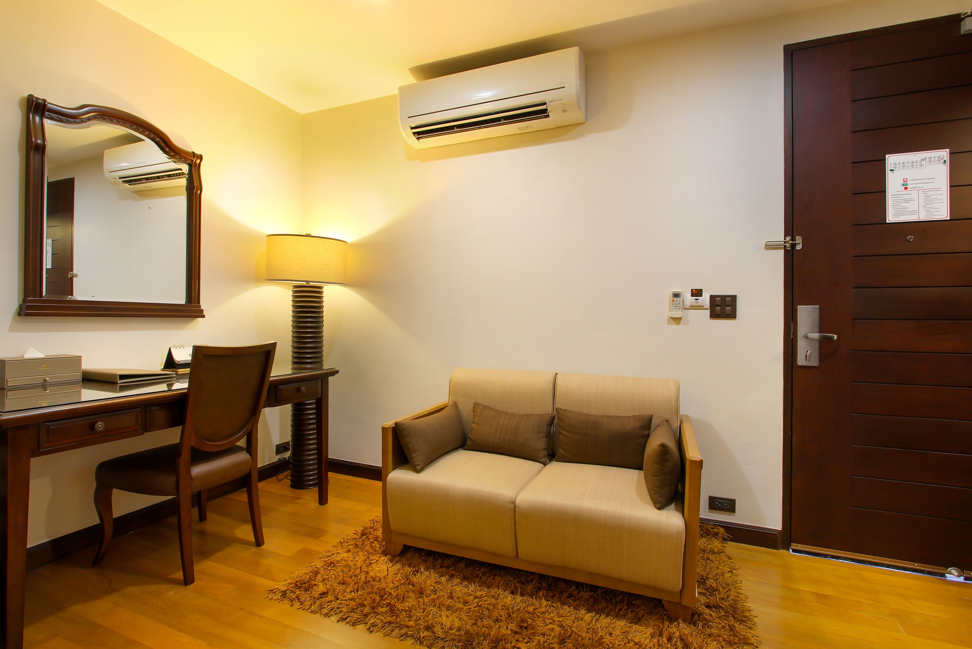 deluxe twin room | living area | lcd tv