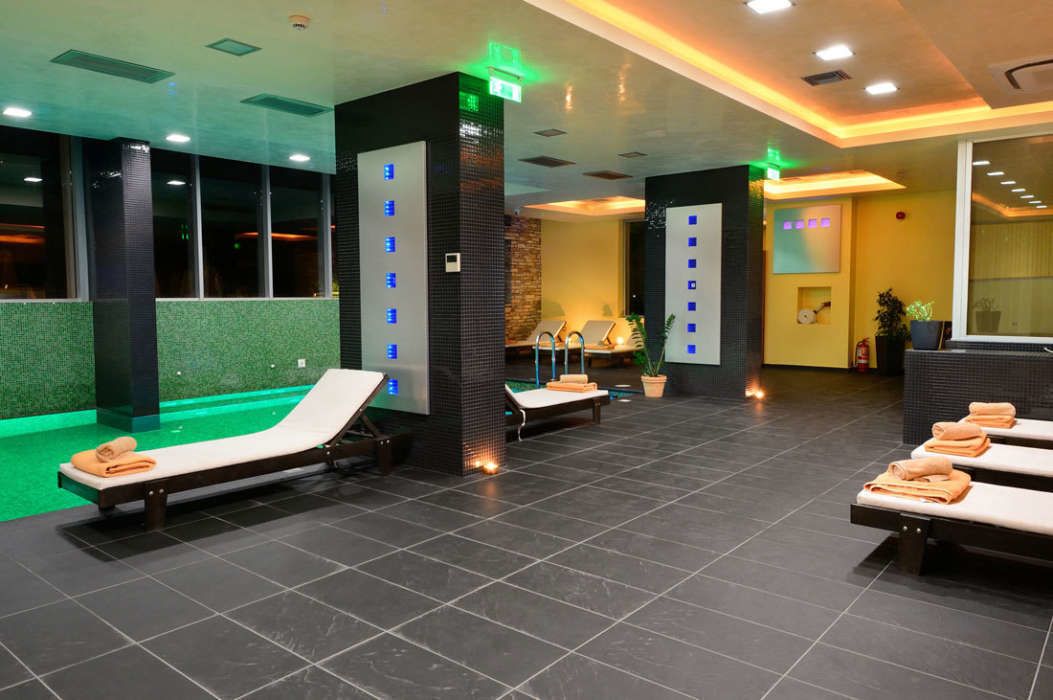 indoor pool, outdoor pool, pool umbrellas, pool loungers