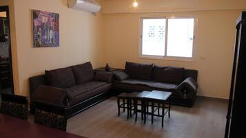 Apartment, 2 Bedrooms (Bouznika 2) | Living room | Flat-screen TV