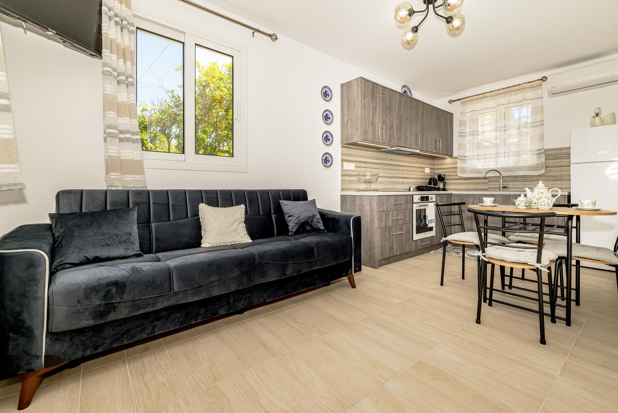 Appartement, 1 slaapkamer, terras | Woonruimte | Flatscreentelevisie