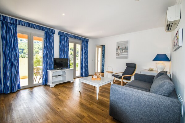 LĂ€genhet - 1 sovrum | Vardagsrum | Plasma-tv