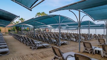 Private beach, sun loungers, beach umbrellas, beach towels