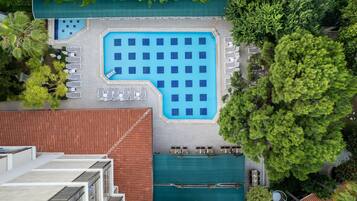 Indoor pool, seasonal outdoor pool, pool umbrellas, sun loungers