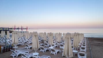 Private beach, sun loungers, beach umbrellas, beach towels