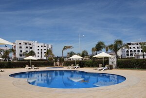 Outdoor pool, open 9:00 AM to 7:00 PM, pool umbrellas, sun loungers