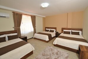 Comfort Triple Room | Premium bedding, individually decorated, desk, laptop workspace