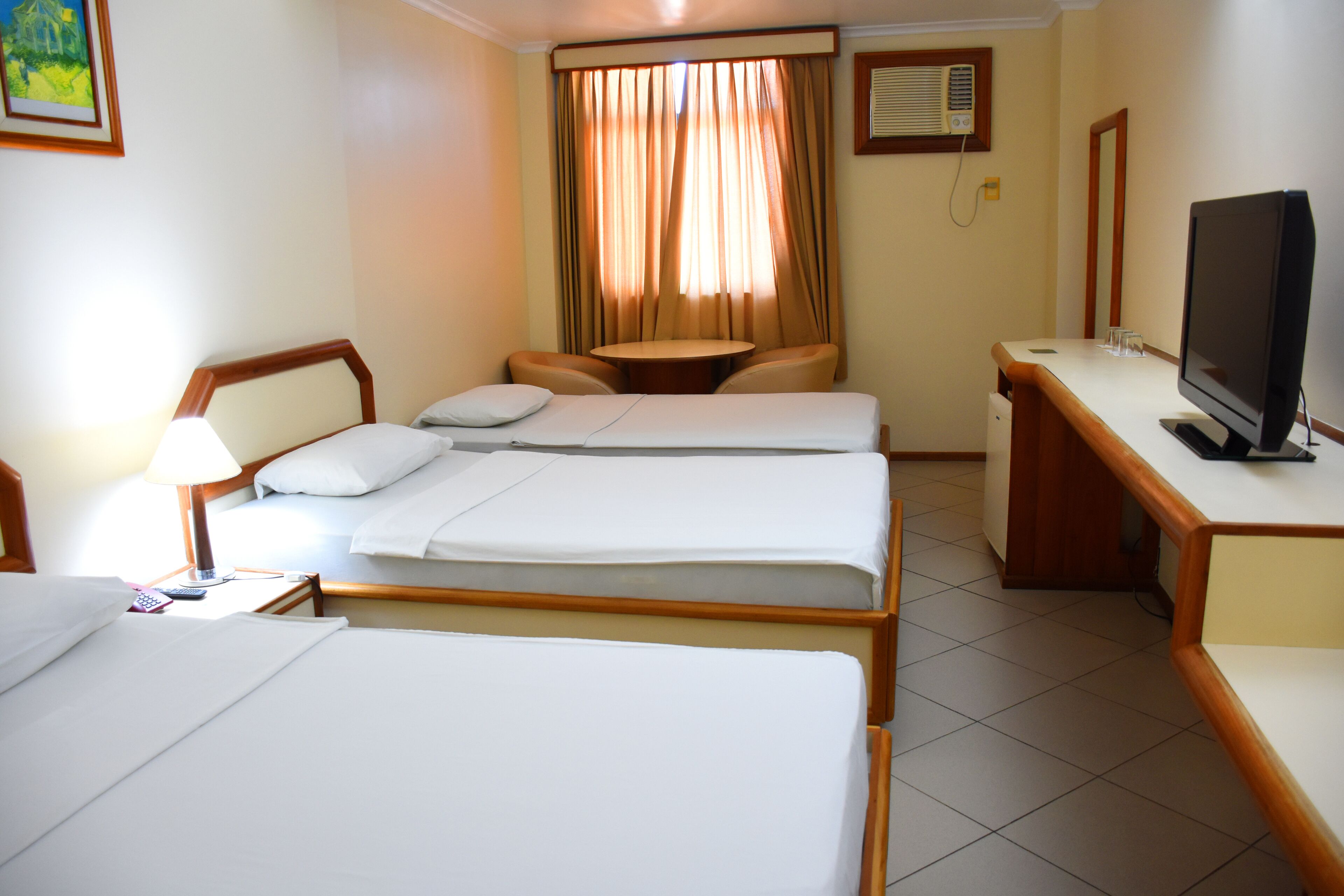 standard triple room, 3 single beds, non smoking, bay view | minibar, desk, blackout curtains, cots/infant beds