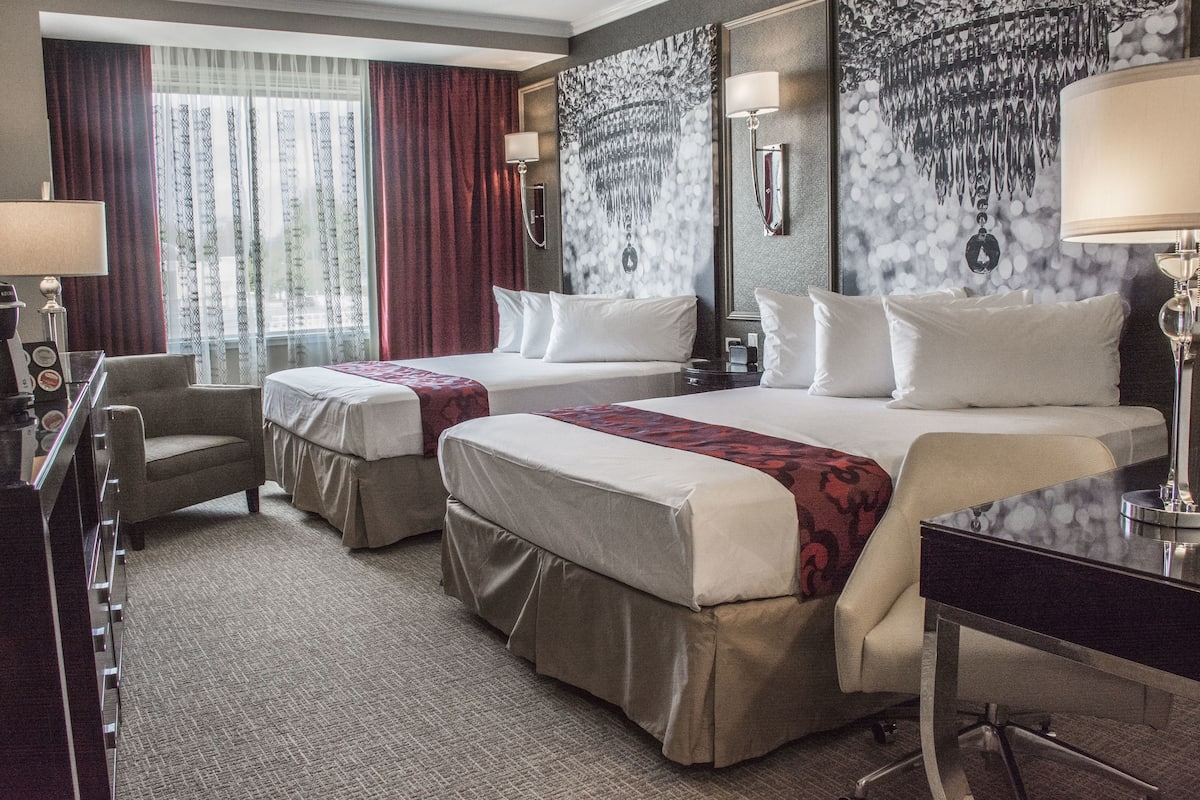 deluxe room, 2 queen beds | premium bedding, minibar, in-room safe, desk