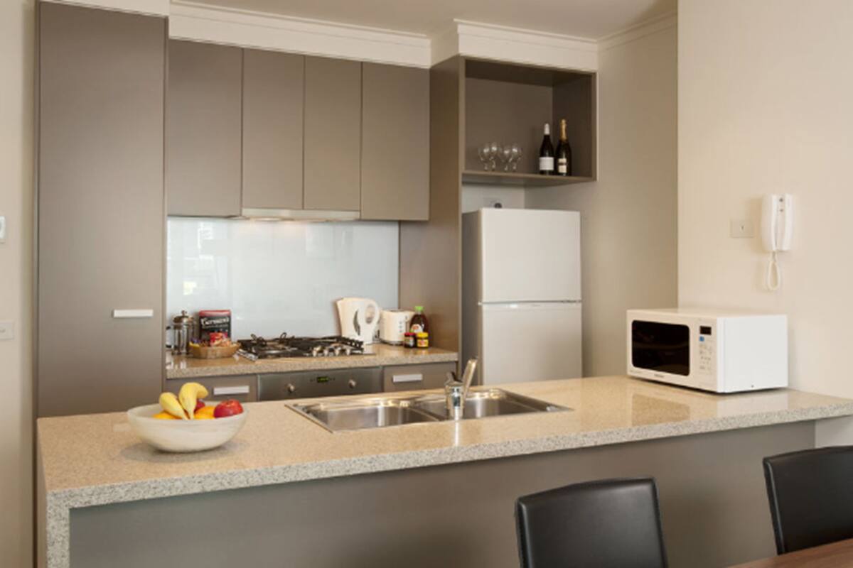 Two Bedroom Two Bathroom Apartment | Private kitchen | Full-size fridge, microwave, oven, stovetop