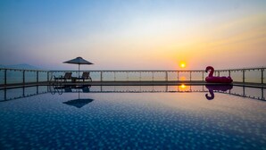 Outdoor pool, open 6:30 AM to 10:00 PM, pool umbrellas, sun loungers - Serene Beach Hotel Danang (Da Nang)
