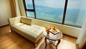 Minibar, in-room safe, desk, laptop workspace - Serene Beach Hotel Danang (Da Nang)