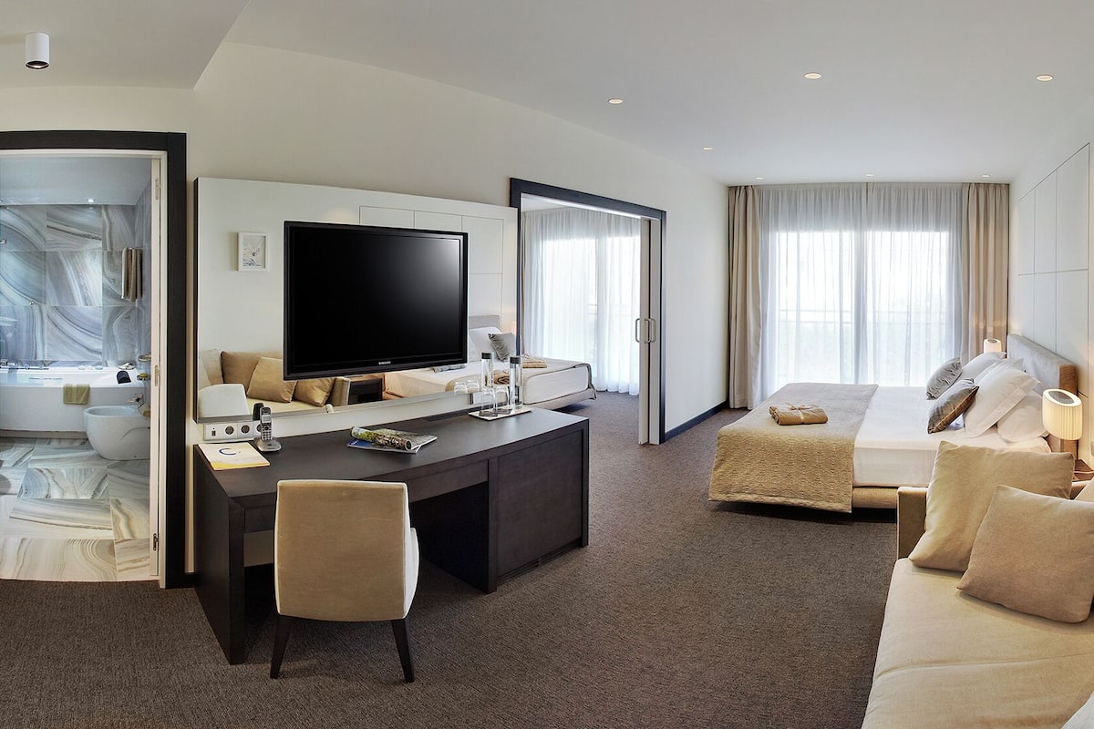 family room, connecting rooms (terrace) | minibar, in-room safe, desk, blackout curtains