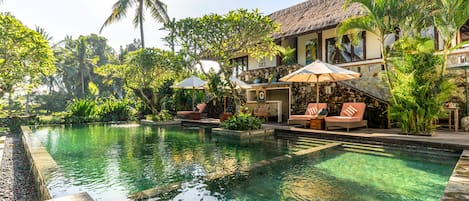 Outdoor pool, open 7:00 AM to 7:00 PM, pool loungers